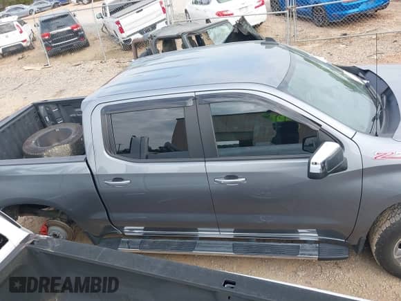 2021 Chevrolet Silverado 1500 LT z VIN 1GCUYDED3MZ411911, wystawiony jako IAAI lot #42005209 z przebiegiem 29 253 mil mil oraz . Historia ofert i sprzedaży dostępna na DreamBid. Obrazek 13.