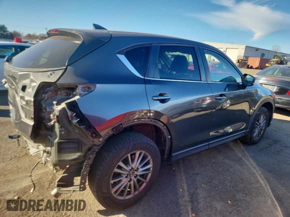 ✅ 2017 Mazda CX-5 Touring • VIN: JM3KFBCL5H0185657 • Lot: 93033995. Listed on Copart with 57,770 mi. Free auction sales archive from the USA and detailed vehicle history report at DreamBid. Image 3.
