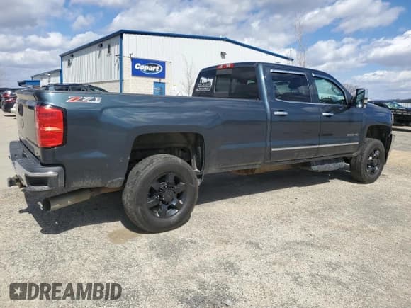 ✅ 2017 Chevrolet Silverado 1500 • VIN: 100000000016199W1 • Лот: 47011105. Опубликован ранее на Copart с пробегом 128 779 миль. Бесплатный доступ к архиву аукционных продаж из США и подробный отчёт об истории автомобиля на DreamBid. Изображение 3.