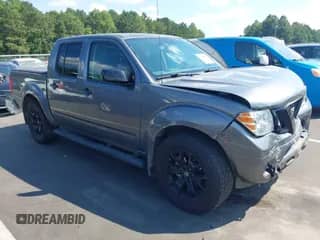 2021 Nissan Frontier Pro-4X with VIN 1N6ED0EB2MN713637, listed as a IAAI auction lot 43128392 with 90,237 mi miles and . Bid and sale history available at DreamBid. Image 1.