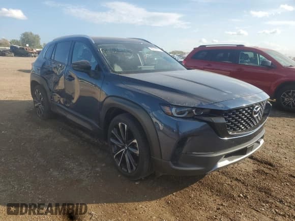 ✅ 2023 Mazda CX-50 Premium Plus • VIN: 7MMVABEY3PN126332 • Lot: 82112775. Listed on Copart with 36,990 mi. Free auction sales archive from the USA and detailed vehicle history report at DreamBid. Image 4.