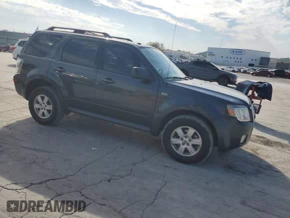 2009 Mercury Mariner с VIN 4M2CU81749KJ01405, выставлен на аукционе Copart как лот 82547795 с пробегом 133 000 миль миль и Списание • Salvage title. История ставок и продаж доступна на DreamBid. Изображение 4.