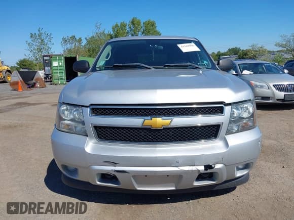 ✅ 2014 Chevrolet Tahoe Commercial • VIN: 1GNLC2E09ER207067 • Lot: 43268966. Listed on IAAI with 227,117 mi. Free auction sales archive from the USA and detailed vehicle history report at DreamBid. Image 12.