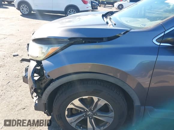 ✅ 2017 Honda CR-V LX • VIN: 7FARW5H39HE013624 • Lot: 43678617. Listed on IAAI with 126,470 mi. Free auction sales archive from the USA and detailed vehicle history report at DreamBid. Image 6.