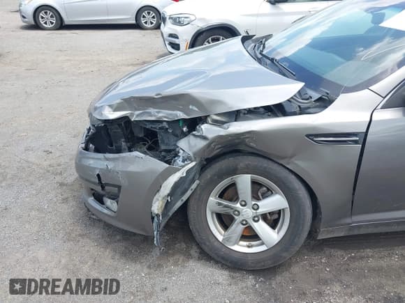 ✅ 2014 Kia Optima LX • VIN: 5XXGM4A7XEG313486 • Лот: 42517437. Опубликован ранее на IAAI с пробегом 70 444 миль. Бесплатный доступ к архиву аукционных продаж из США и подробный отчёт об истории автомобиля на DreamBid. Изображение 13.