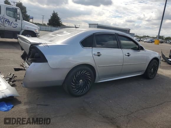 ✅ 2014 Chevrolet Impala LTZ • VIN: 2G1WC5E37E1131500 • Lot: 85512325. Listed on Copart with 165,352 mi. Free auction sales archive from the USA and detailed vehicle history report at DreamBid. Image 3.