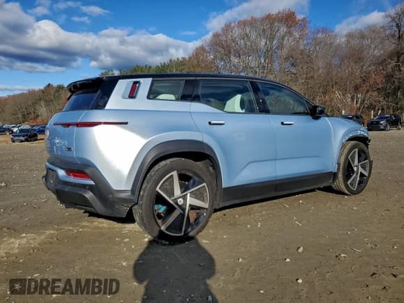 ✅ 2023 Fisker Ocean One • VIN: VCF1ZBU21PG004710 • Lot: 93504935. Listed on Copart with 12,437 mi. Free auction sales archive from the USA and detailed vehicle history report at DreamBid. Image 3.