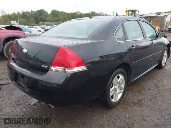 2014 Chevrolet Impala LT with VIN 2G1WB5E30E1121412, listed as a IAAI auction lot 43380958 with 116,443 mi miles and . Bid and sale history available at DreamBid. Image 4.