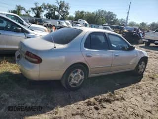 ✅ 1996 Nissan Altima XE • VIN: 1N4BU31D0TC157956 • Lot: 80838464. Listed on Copart with 132,503 mi. Free auction sales archive from the USA and detailed vehicle history report at DreamBid. Image 3.