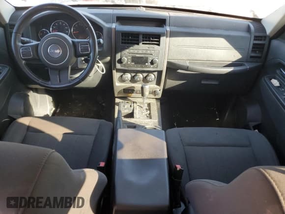 ✅ 2012 Jeep Liberty Sport • VIN: 1C4PJMAK1CW121642 • Lot: 86540585. Listed on Copart with 197,776 mi. Free auction sales archive from the USA and detailed vehicle history report at DreamBid. Image 8.