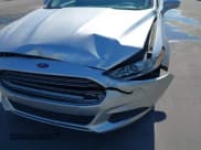 ✅ 2013 Ford Fusion SE Hybrid • VIN: 3FA6P0LU8DR262977 • Lot: 43729571. Listed on IAAI with 115,875 mi. Free auction sales archive from the USA and detailed vehicle history report at DreamBid. Image 6.