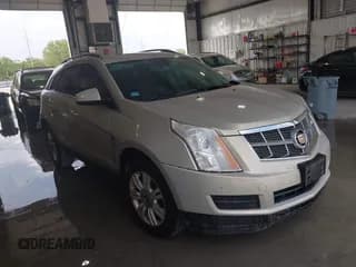 ✅ 2012 Cadillac SRX • VIN: 3GYFNGE38CS572089 • Lot: 42283415. Listed on IAAI with 188,060 mi. Free auction sales archive from the USA and detailed vehicle history report at DreamBid. Image 1.