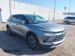 2023 Chevrolet Blazer LT z VIN 3GNKBHR43PS181967, wystawiony jako IAAI lot #43473680 z przebiegiem 104 212 mil mil oraz . Historia ofert i sprzedaży dostępna na DreamBid. Obrazek 1.