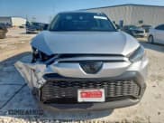 ✅ 2023 Toyota Corolla Cross Hybrid S • VIN: 7MUFBABG6PV011974 • Лот: 69835775. Опубликован ранее на Copart с пробегом 12 303 миль. Бесплатный доступ к архиву аукционных продаж из США и подробный отчёт об истории автомобиля на DreamBid. Изображение 5.