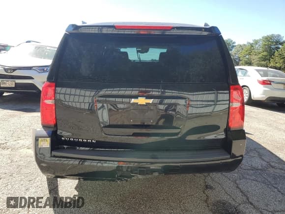 ✅ 2020 Chevrolet Suburban LT • VIN: 1GNSCHKC5LR305605 • Lot: 75447164. Wystawiony na Copart z przebiegiem 176 775 mil. Bezpłatny archiwum sprzedaży aukcyjnych z USA i szczegółowy raport historii pojazdu na DreamBid. Zdjęcie 6.