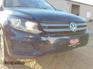 ✅ 2012 Volkswagen Tiguan S • VIN: WVGAV7AX8CW607335 • Lot: 43641053. Wystawiony na IAAI z przebiegiem 127 340 mil. Bezpłatny archiwum sprzedaży aukcyjnych z USA i szczegółowy raport historii pojazdu na DreamBid. Zdjęcie 6.