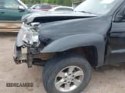 ✅ 2011 Toyota Tacoma • VIN: 5TFPX4EN1BX005899 • Lot: 42626321. Listed on IAAI with 152,098 mi. Free auction sales archive from the USA and detailed vehicle history report at DreamBid. Image 6.