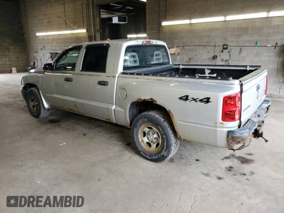 2007 Dodge Dakota ST z VIN 1D7HW28N37S144269, wystawiony jako Copart lot #56395474 z przebiegiem 101 210 mil mil oraz Nie do naprawy • Non repairable. Historia ofert i sprzedaży dostępna na DreamBid. Obrazek 2.