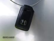 ✅ 2018 Honda Civic EX-T • VIN: JHMFC1F38JX020125 • Lot: 42342438. Listed on IAAI with 115,037 mi. Free auction sales archive from the USA and detailed vehicle history report at DreamBid. Image 11.