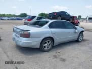 ✅ 2001 Pontiac Bonneville SE • VIN: 1G2HX54K714248607 • Lot: 42389574. Listed on IAAI with 95,907 mi. Free auction sales archive from the USA and detailed vehicle history report at DreamBid. Image 4.