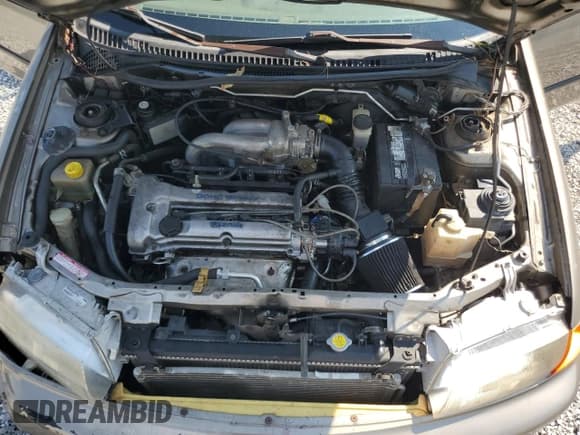 ✅ 1997 Mazda Protege DX • VIN: JM1BC1416V0145687 • Lot: 81469525. Wystawiony na Copart z przebiegiem 277 313 mil. Bezpłatny archiwum sprzedaży aukcyjnych z USA i szczegółowy raport historii pojazdu na DreamBid. Zdjęcie 11.