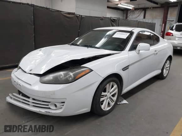 2008 Hyundai Tiburon GS с VIN KMHHM66D98U280005, выставлен на аукционе IAAI как лот 42580014 с пробегом 267 858 миль миль и . История ставок и продаж доступна на DreamBid. Изображение 17.