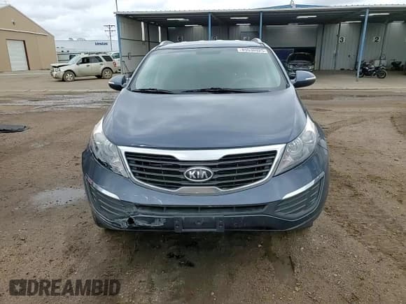 ✅ 2012 Kia Sportage LX • VIN: KNDPBCA27C7297290 • Lot: 85530925. Listed on Copart with 86,648 mi. Free auction sales archive from the USA and detailed vehicle history report at DreamBid. Image 14.