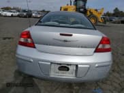 ✅ 2004 Chrysler Sebring LXi • VIN: 4C3AG52H24E131975 • Lot: 79116364. Wystawiony na Copart z przebiegiem 229 972 mil. Bezpłatny archiwum sprzedaży aukcyjnych z USA i szczegółowy raport historii pojazdu na DreamBid. Zdjęcie 6.