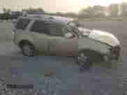 2010 Mercury Mariner Premier с VIN 4M2CN9HG4AKJ12675, выставлен на аукционе Copart как лот 71417445 с пробегом Не указан миль и Списание • Salvage title. История ставок и продаж доступна на DreamBid. Изображение 4.