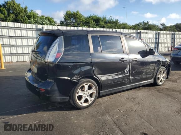 ✅ 2010 Mazda 5 Touring • VIN: JM1CR2W39A0378772 • Lot: 82727935. Listed on Copart with 102,922 mi. Free auction sales archive from the USA and detailed vehicle history report at DreamBid. Image 3.