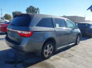 ✅ 2011 Honda Odyssey Touring • VIN: 5FNRL5H98BB063513 • Lot: 43599881. Listed on IAAI with 125,920 mi. Free auction sales archive from the USA and detailed vehicle history report at DreamBid. Image 4.