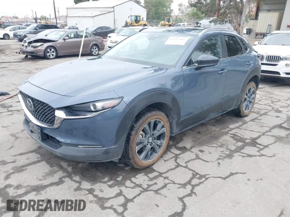 ✅ 2022 Mazda CX-30 S Carbon Edition • VIN: 3MVDMBCL0NM456154 • Lot: 42153202. Listed on IAAI with 40,372 mi. Free auction sales archive from the USA and detailed vehicle history report at DreamBid. Image 17.