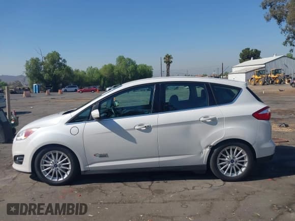 ✅ 2016 Ford C-Max SEL • VIN: 1FADP5CU8GL112343 • Лот: 42922638. Опубликован ранее на IAAI с пробегом 205 856 миль. Бесплатный доступ к архиву аукционных продаж из США и подробный отчёт об истории автомобиля на DreamBid. Изображение 14.