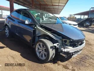 ✅ 2023 Tesla Model Y Long Range • VIN: 7SAYGDEE0PF877614 • Lot: 43543455. Listed on IAAI with 24,490 mi. Free auction sales archive from the USA and detailed vehicle history report at DreamBid. Image 1.