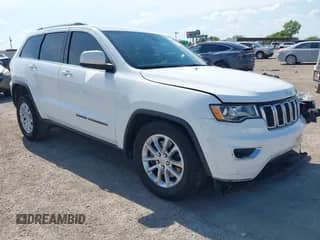2021 Jeep Grand Cherokee Laredo E with VIN 1C4RJEAG1MC831072, listed as a IAAI auction lot 42993482 with 111,059 mi miles and . Bid and sale history available at DreamBid. Image 1.