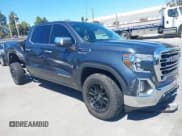 ✅ 2022 GMC Sierra 1500 SLT • VIN: 1GTU9DELONZ219903 • Lot: 40140320. Listed on IAAI with 57,019 mi. Free auction sales archive from the USA and detailed vehicle history report at DreamBid. Image 1.