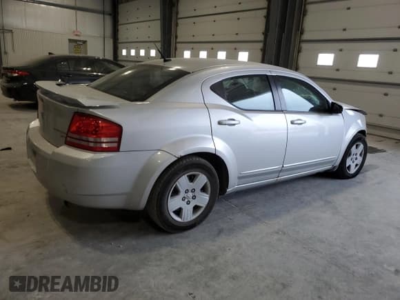 ✅ 2010 Dodge Avenger SXT • VIN: 1B3CC4FB5AN185527 • Лот: 83856564. Опубликован ранее на Copart с пробегом 207 558 миль. Бесплатный доступ к архиву аукционных продаж из США и подробный отчёт об истории автомобиля на DreamBid. Изображение 3.