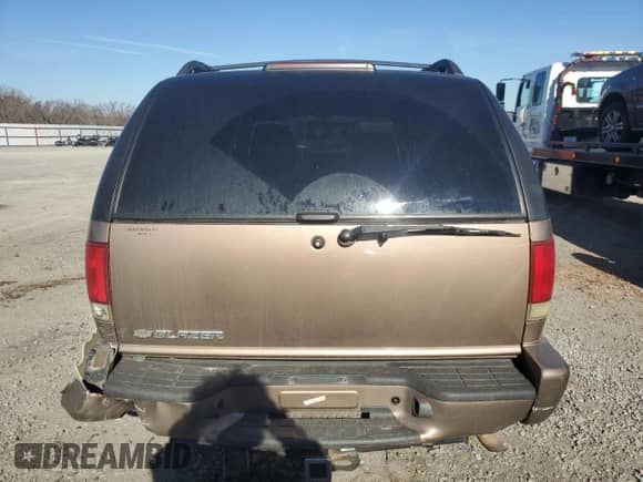 ✅ 2004 Chevrolet Blazer LS • VIN: 1GNDT13X84K158661 • Lot: 85697264. Wystawiony na Copart z przebiegiem 163 809 mil. Bezpłatny archiwum sprzedaży aukcyjnych z USA i szczegółowy raport historii pojazdu na DreamBid. Zdjęcie 6.