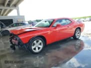 ✅ 2014 Dodge Challenger SXT • VIN: 2C3CDYAG1EH149553 • Lot: 61911644. Wystawiony na Copart z przebiegiem 147 101 mil. Bezpłatny archiwum sprzedaży aukcyjnych z USA i szczegółowy raport historii pojazdu na DreamBid. Zdjęcie 1.