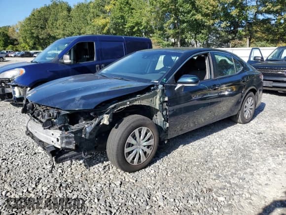 ✅ 2020 Toyota Camry Hybrid LE • VIN: 4T1E31AK4LU518253 • Lot: 80797575. Listed on Copart with 140,534 mi. Free auction sales archive from the USA and detailed vehicle history report at DreamBid. Image 1.