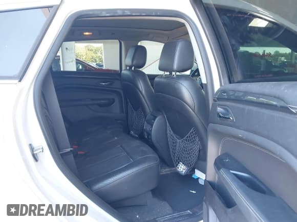 ✅ 2016 Cadillac SRX Performance Collection • VIN: 3GYFNCE30GS565930 • Lot: 43711639. Listed on IAAI with 112,092 mi. Free auction sales archive from the USA and detailed vehicle history report at DreamBid. Image 8.