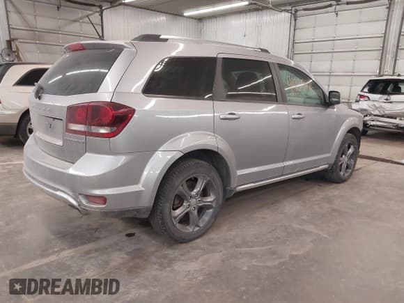 ✅ 2015 Dodge Journey Crossroad • VIN: 3C4PDCGG8FT631064 • Lot: 41235846. Listed on IAAI with 127,718 mi. Free auction sales archive from the USA and detailed vehicle history report at DreamBid. Image 4.