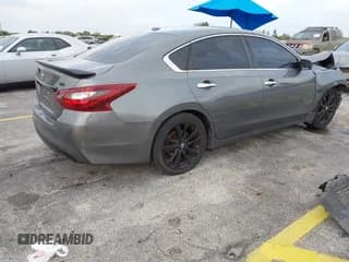 ✅ 2018 Nissan Altima SL • VIN: 1N4AL3AP5JC182311 • Lot: 43628576. Listed on IAAI with 117,950 mi. Free auction sales archive from the USA and detailed vehicle history report at DreamBid. Image 4.