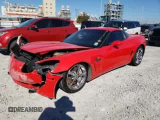 2011 Chevrolet Corvette Z16 Grand Sport 2LT with VIN 1G1YV2DW7B5102618, listed as a Copart auction lot 82990634 with 85,402 mi miles and Salvage title. Bid and sale history available at DreamBid. Image 1.