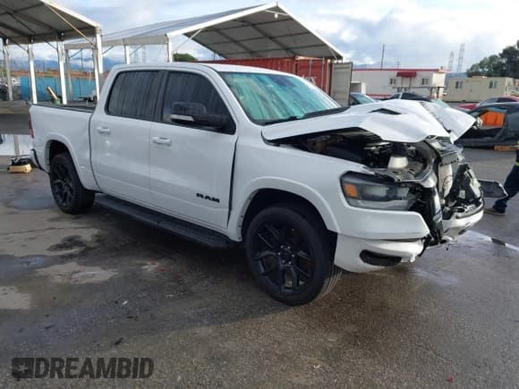 ✅ 2022 Ram 1500 Laramie • VIN: 1C6RREJM5NN276798 • Lot: 43688940. Listed on IAAI with 64,582 mi. Free auction sales archive from the USA and detailed vehicle history report at DreamBid. Image 1.