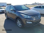 ✅ 2013 Hyundai Santa Fe Sport • VIN: 5XYZW3LA5DG040716 • Lot: 43681898. Listed on IAAI with 214,736 mi. Free auction sales archive from the USA and detailed vehicle history report at DreamBid. Image 1.