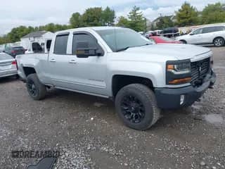 2018 Chevrolet Silverado 1500 LT z VIN 1GCVKREC9JZ109755, wystawiony jako IAAI lot #43396692 z przebiegiem 141 137 mil mil oraz . Historia ofert i sprzedaży dostępna na DreamBid. Obrazek 1.