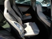 ✅ 2018 Tesla Model X 75D • VIN: 5YJXCBE23JF103458 • Лот: 69646965. Опубликован ранее на Copart с пробегом 99 232 миль. Бесплатный доступ к архиву аукционных продаж из США и подробный отчёт об истории автомобиля на DreamBid. Изображение 11.