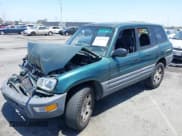 ✅ 1998 Toyota RAV4 • VIN: JT3GP10V7W0034249 • Lot: 42327932. Wystawiony na IAAI z przebiegiem 261 840 mil. Bezpłatny archiwum sprzedaży aukcyjnych z USA i szczegółowy raport historii pojazdu na DreamBid. Zdjęcie 2.