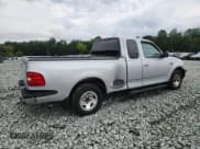 ✅ 1998 Ford F-150 XL • VIN: 1FTZX0761WKB67929 • Lot: 68511535. Listed on Copart with 209,309 mi. Free auction sales archive from the USA and detailed vehicle history report at DreamBid. Image 3.